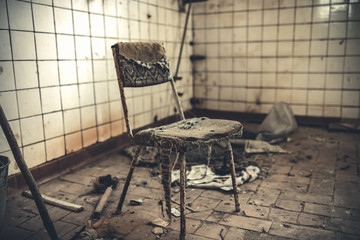 Old lonely chair in an abandoned place