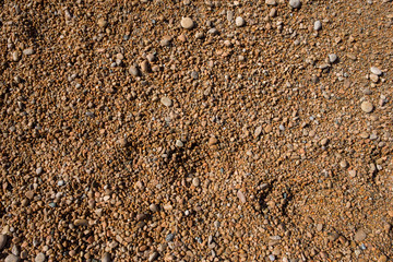 Background of small and brown beach stones