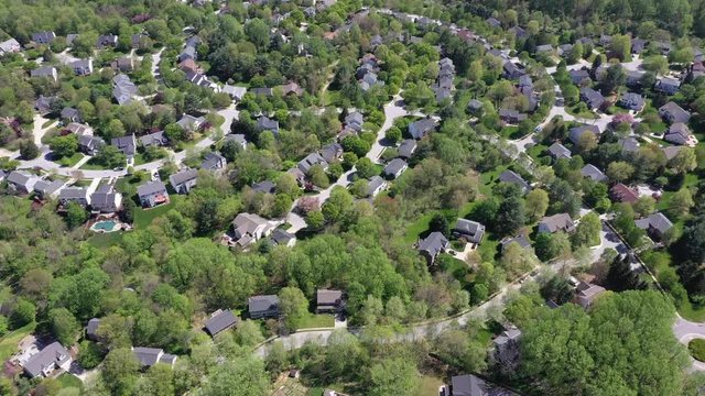 upper middle class american neighborhood with curving street in Maryland