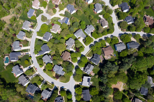 upper middle class american neighborhood with curving street in Maryland