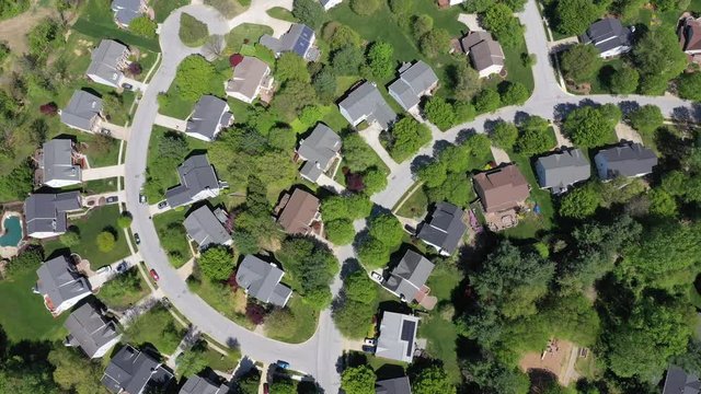 upper middle class american neighborhood with curving street in Maryland