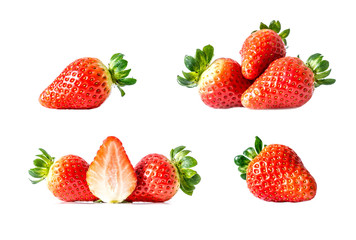 Obraz na płótnie Canvas Set of fresh ripe red strawberries with green leaves close-up, isolated on a white background. A large size photo of a collection of ripe strawberries, isolated on a white background.