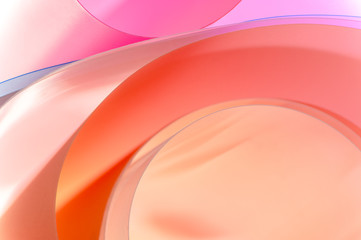 Background of multicolored semicircular elements with a gradient in cartoon style.