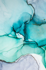 Alcohol ink sea texture. Contemporary art. Spots of oil paint. Abstract art background. Multicolored bright texture. Fragment of artwork. Modern art. Inspired by the sky, as well as steam and smoke.