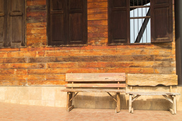 the two retro wood chair under sunlight at the roadside
