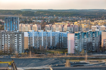 Fototapeta premium Panoramic view on new quarter high-rise building area urban development residential quarter in the evening from a bird's eye view
