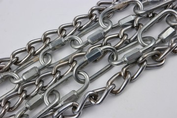 Metal chain on the white background