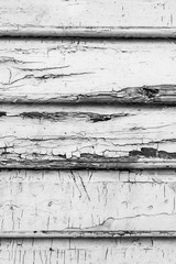Wood texture close-up photo. Vintage wooden wall background. White cracked paint plank panels