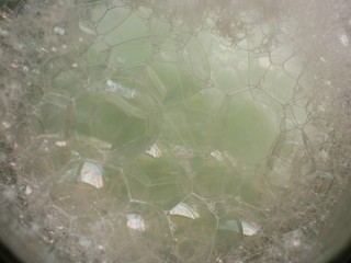 bubbles in water shampoo soap, close up bubble