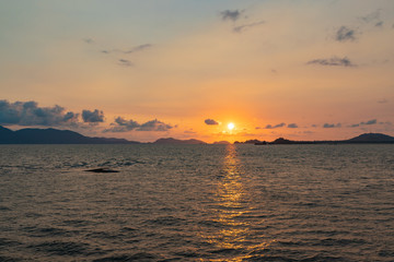 Fototapeta na wymiar Sunset near Koh Chang island, Gulf of Thailand. Photo from ferry,