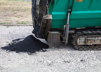 Fototapeta premium Paver working on the road construction