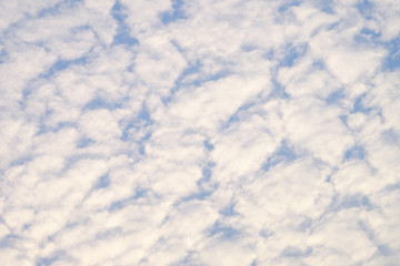 Pattern of white cloud on bright blue sky