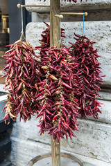 Red dried chili peppers bunch background. Selective focus