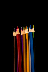 Set beautiful black, colored pencils of colored pencils on black background. Soon to school. Back to School