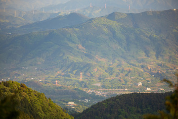 Electrical transmission towers do mountainous landscape in Wakayama, Japan