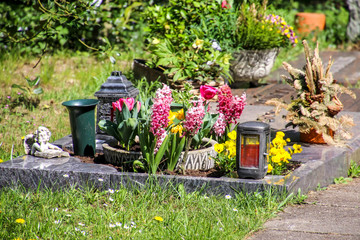 Cemetery, grave, flowers and Candle