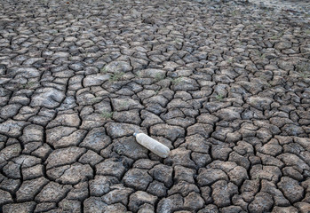Old plastic bottle on the ground
