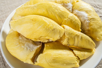 A dish of fresh ripe yellow delicious durian flesh