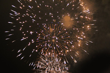 A fabulous view of bright yellow firework lights. during Halloween, Christmas, Independence Day, New Year.