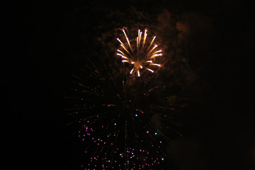 Beautiful placer bright yellow shiny lights of fireworks during Halloween, Christmas, Independence...