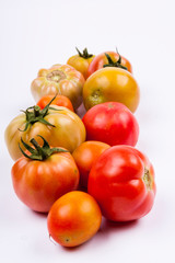 Red tomatoes - white background.