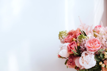 Beautiful blossoming flowers: peonies, roses, ranunculus, tulips, carnations,eustoma lisianthks hydrangea in tender pink colour