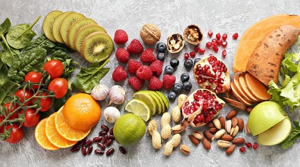 Healthy food. Selection of fruits, berries,vegetables, cereals and nuts for healthy eating concept. 