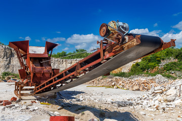 Old rusty crushing machine