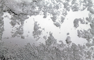 heart of snow on the glass. sleet on glass