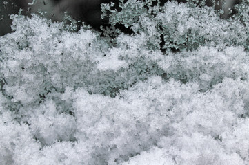 melting snow on the glass. sleet on glass