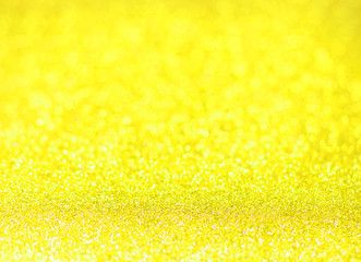 Yellow glitter shiny texture background for christmas, Celebration concept.
