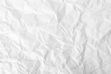 White crumpled paper texture background.