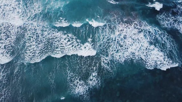 beautiful blue ocean wave from above, water surface texture background aerial view from drone, 4K video