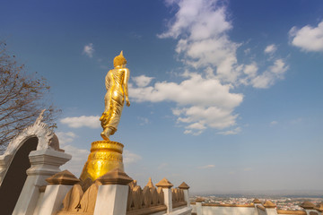 Fototapeta na wymiar Buddha standing on a mountain Wat Phra That Khao Noi, Nan Province, Thailand