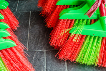 Colorful brooms.