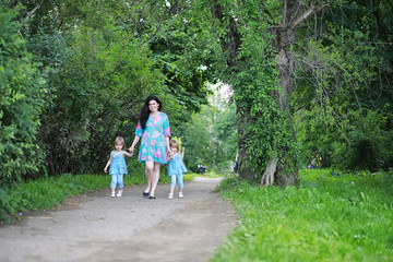 Mom with two daughters twins