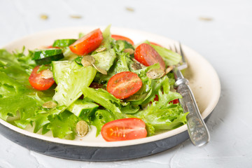 Simple vegetable salad on a light background