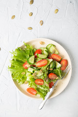 Simple vegetable salad on a light background