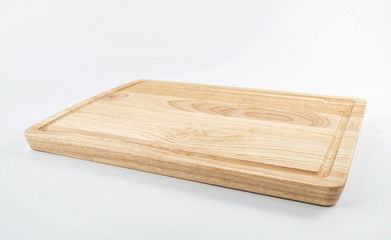 a wooden chopping board on a white background