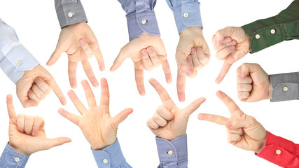 Fototapeta premium Various gestures of male hands between each other on a white background