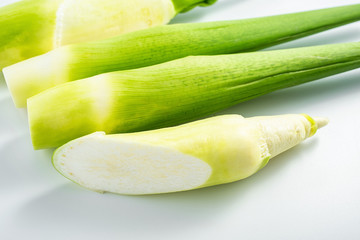 Fresh aquatic vegetables simmered on white background