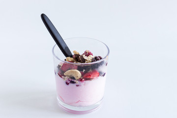 Yogurt with fresh fruits and fibers, isolated on white background