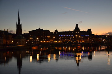 Naklejka premium Stockholm city street panorama city stone blocks square shop road pavement signs road city streets city lights city mood 