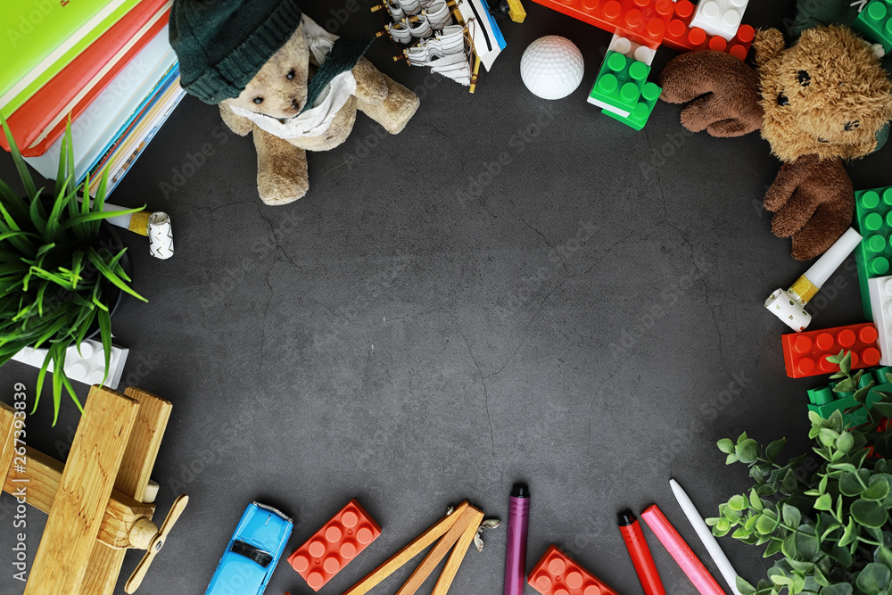 Sticker Background. Children's toys on the table. Space between kid's toys.