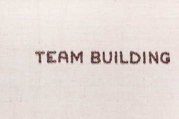 The words Team Building written with coffee beans,aligned to the right.