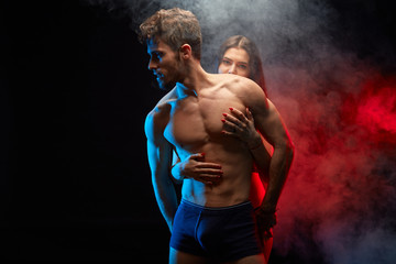 man and woman having erotic feeling and experience. close up photo. isolated black background