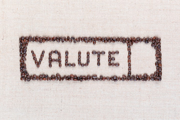The word valute inside a rectangle made from coffee beans,aligned in the center,closeup.