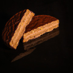 cookies Chocolate (dark background with reflection) sweet dessert. food background. top