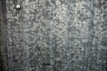 old gray spangled galvanized corrugated steel wall detail