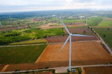Aerial view of wind turbines on the field. Production of clean energy without pollution for the environment. Cleaner Power generation